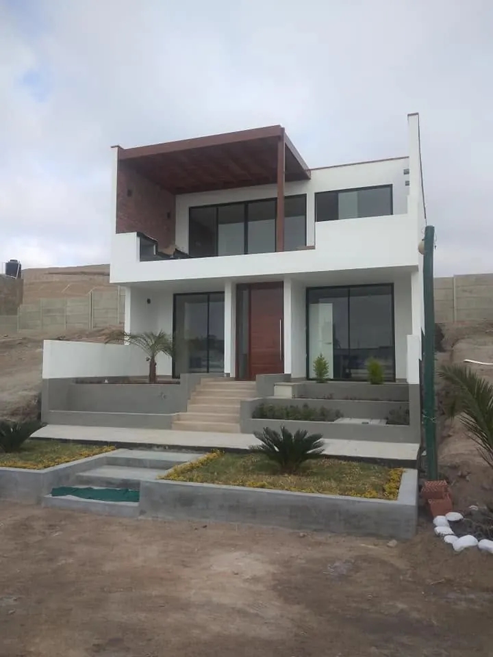 Casa de playa con pérgola - Puertas Diazsa